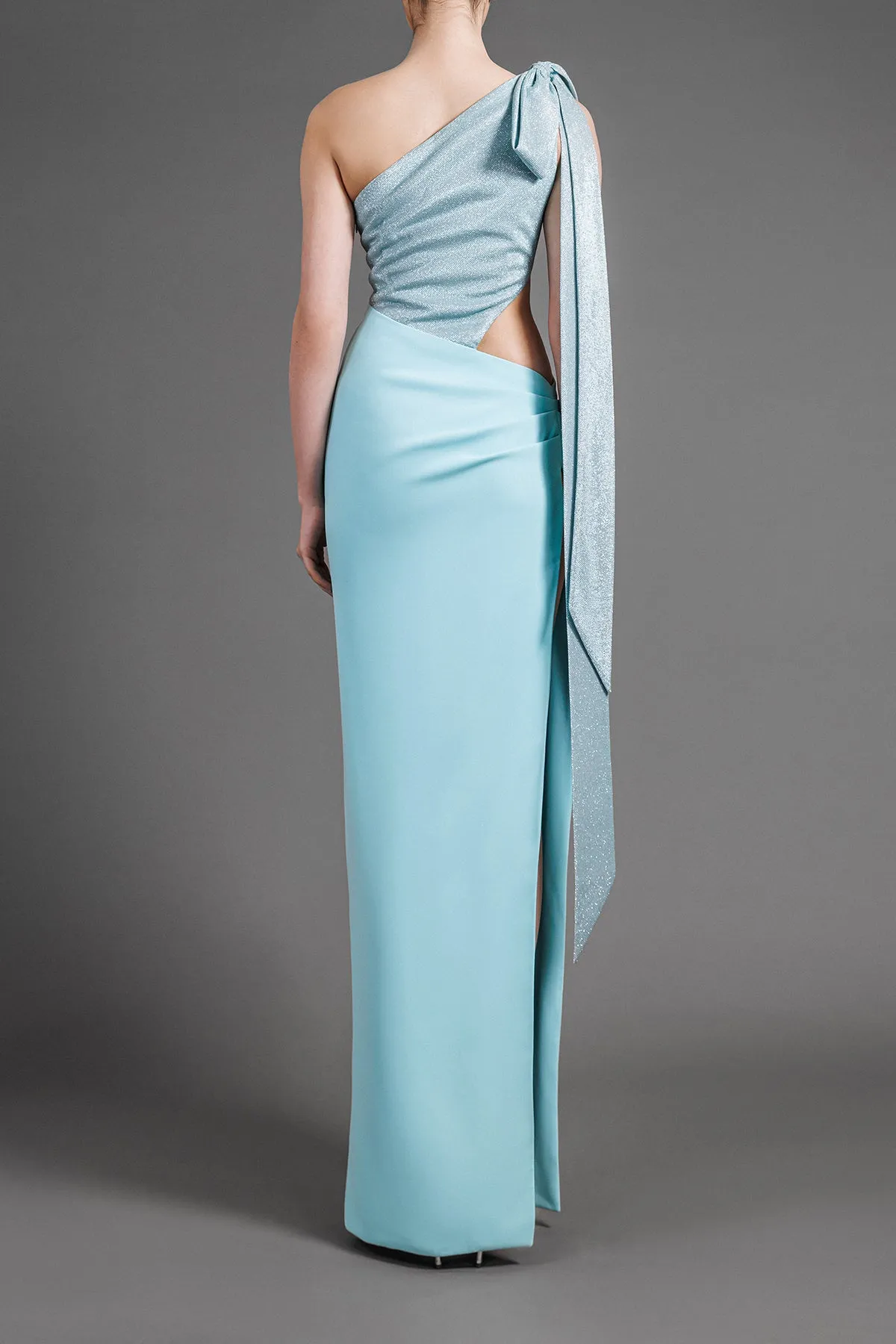 One-shoulder aqua green dress in lurex and crêpe with bow detail