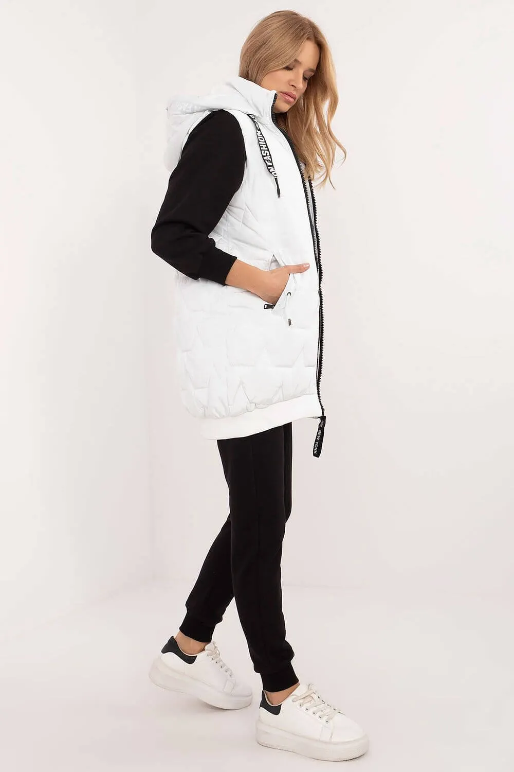 Versatile Warmth: Quilted Knee-Length Vest with Detachable Hood